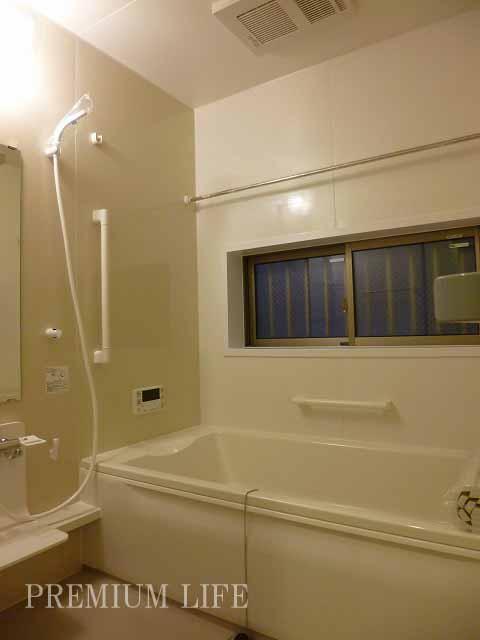 Bathroom.  [bathroom] Spacious bathroom with a window.