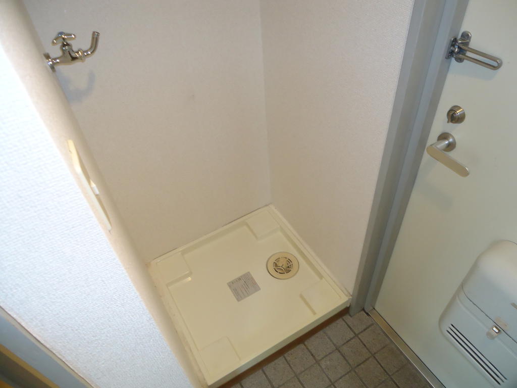 Other Equipment. Washing machine in the room