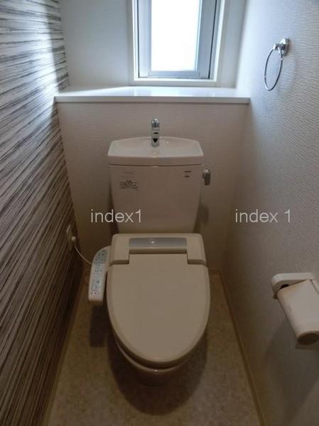 Toilet. Happy is with a bidet!