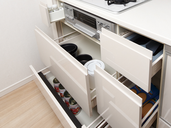 Kitchen.  [Slide with storage bull motion] It is easy to remove things in the bottom storage of kitchen counter, Sliding that can be leveraged up to the back of the space. It is with Bull motion slide rails close to slowly quiet. Bottom plate adopts steel enamel of the slide housing. Wiped off easily even if you, such as soy sauce and oil spills, Easy to clean, Scratch is hard specifications attached also. (Under the sink cabinet only)