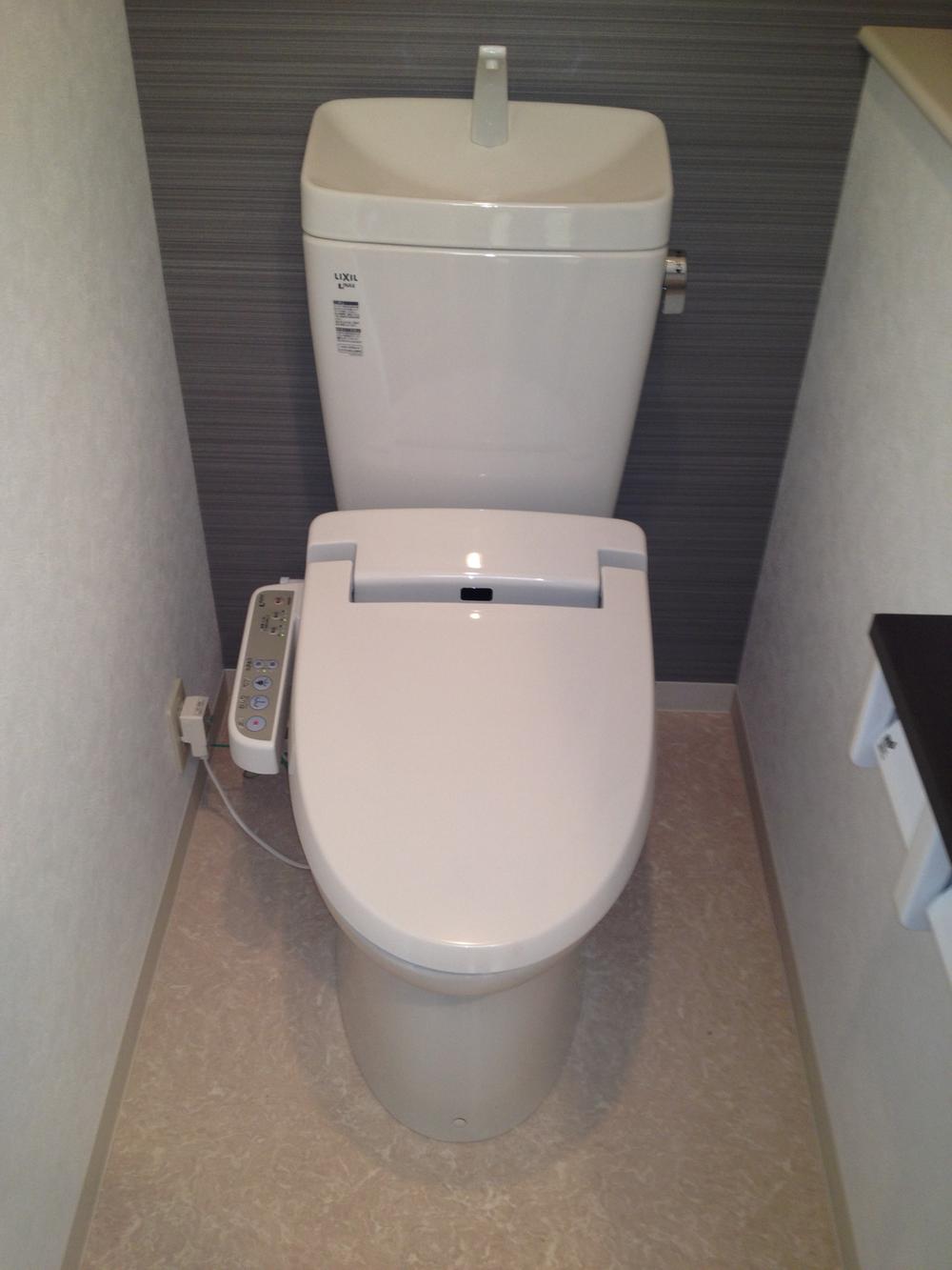 Toilet. A new installation of Washlet toilet