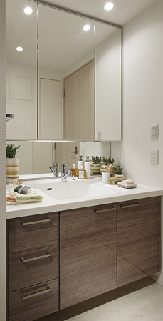 Bathing-wash room.  [Washbasin lower receiving] Prepare the space of the room to the bottom of the vanity can be stored such as towels and laundry equipment. Keep the refreshing impression of vanity room. Also, Secure a space to clean and organize, such as toiletries and make-up supplies to the three-sided mirror back. Also it provides, such as dryer space with a hook.