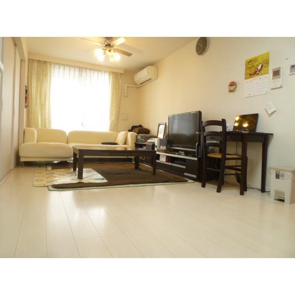 Living. Bright living room facing the southwest balcony