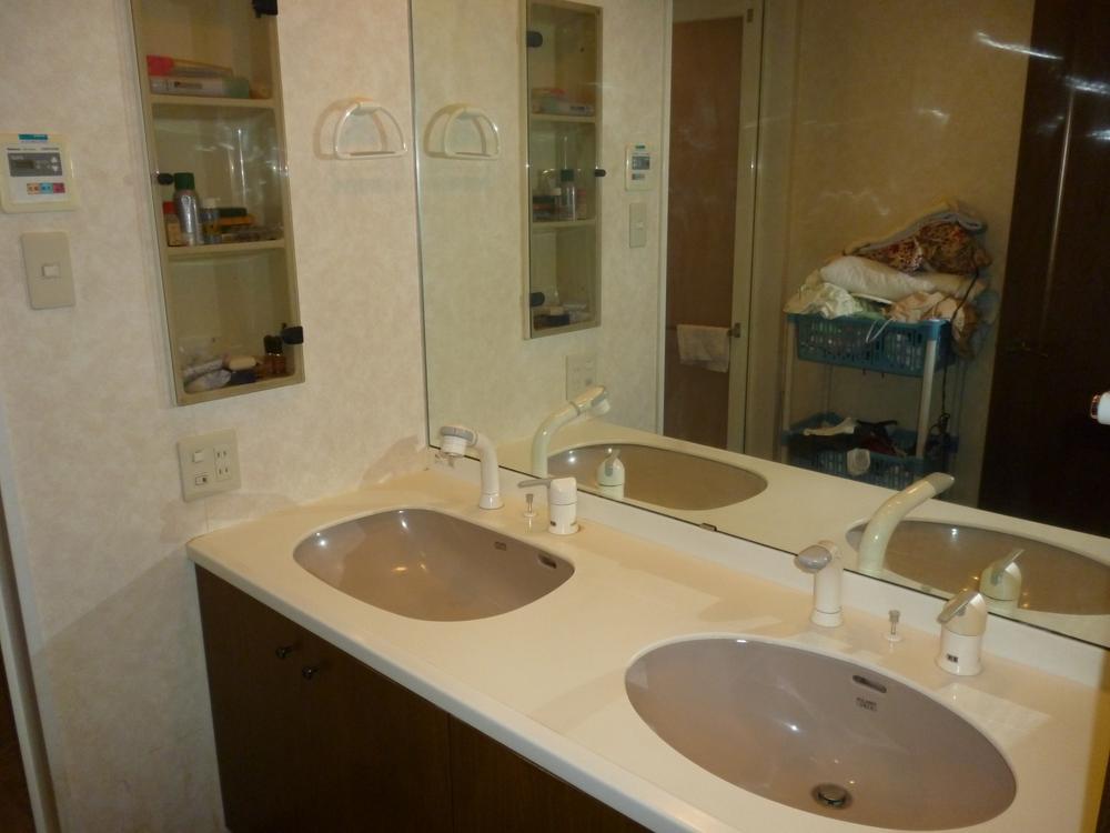 Wash basin, toilet. Basin is two places