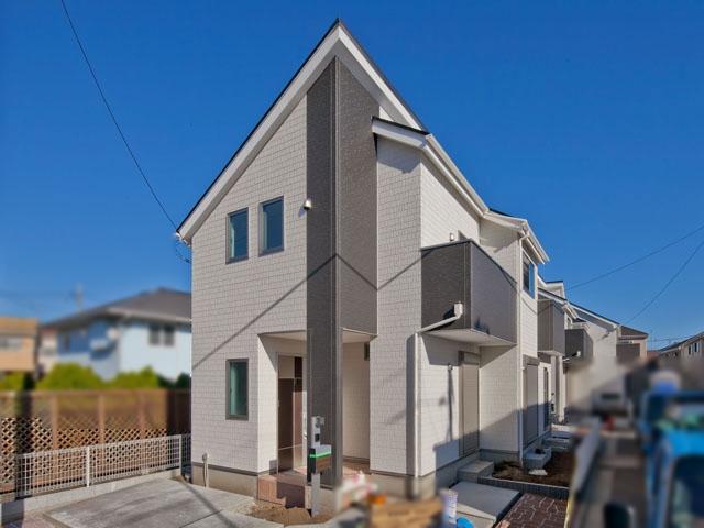 Local appearance photo. O Building Nearing completion