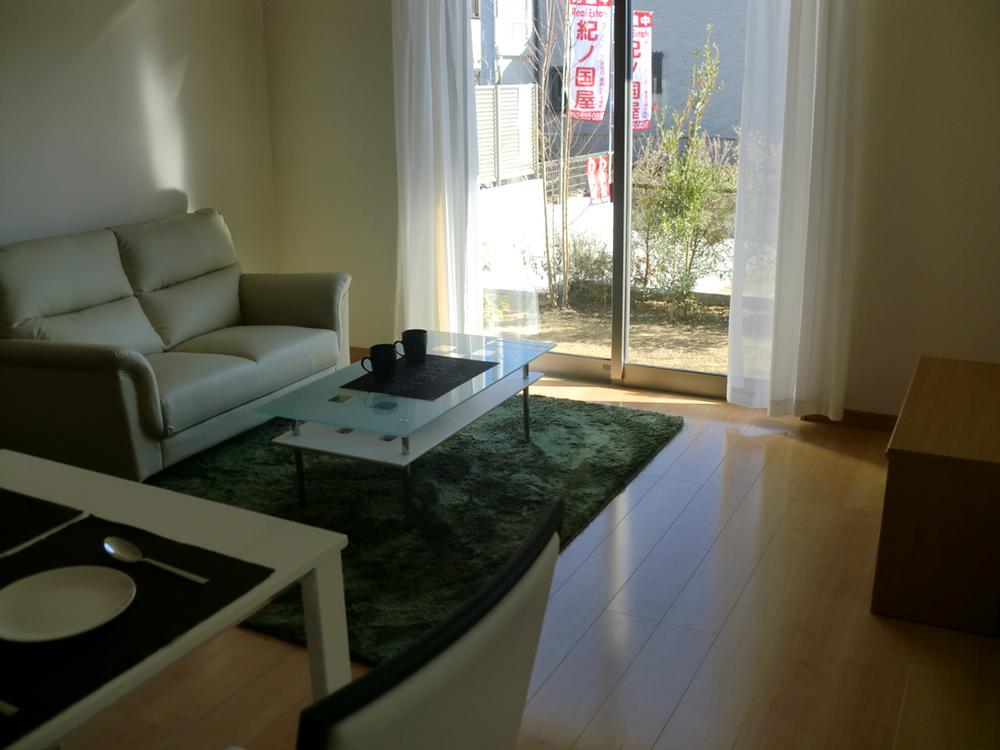 Living. The photograph is an image.