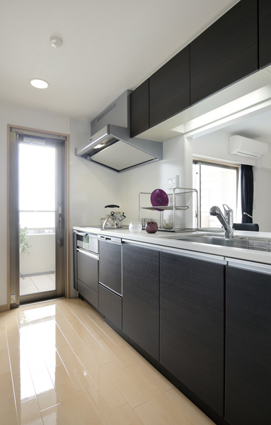 Kitchen with a back door to be out on the balcony