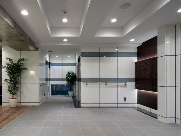 Features of the building.  [Entrance hall] While directing the texture stately and dignified, Entrance Hall finished in soft atmosphere using indirect lighting.