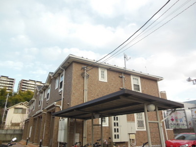 Building appearance. About 4 minutes by bicycle to Minami-Osawa Station