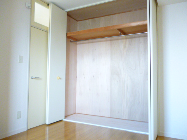 Living and room. Abundant storage with upper closet.