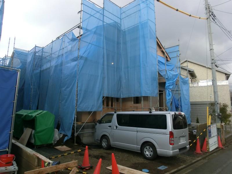 Local photos, including front road. 1 Building