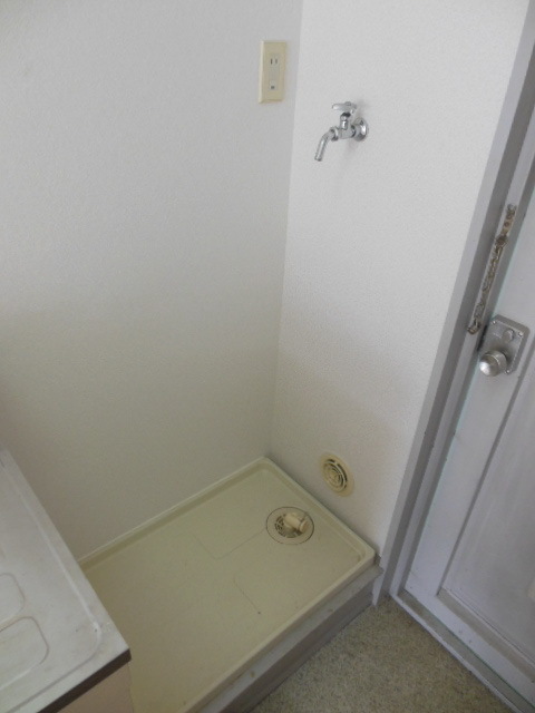 Other Equipment. Washing machine in the room