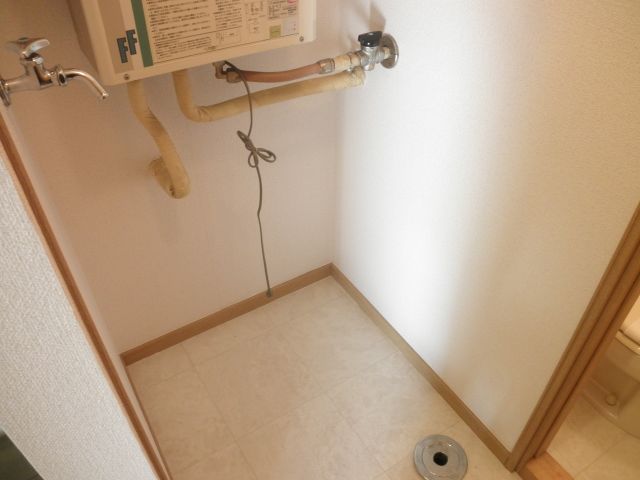 Other. Washing machine storage is located in the room.