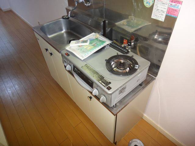 Kitchen. It is a gas stove with a kitchen.