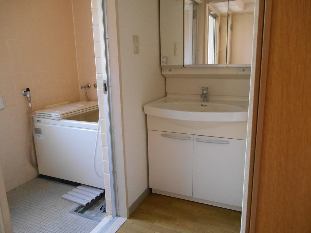 Washroom. Wash basin adjacent to the bathroom