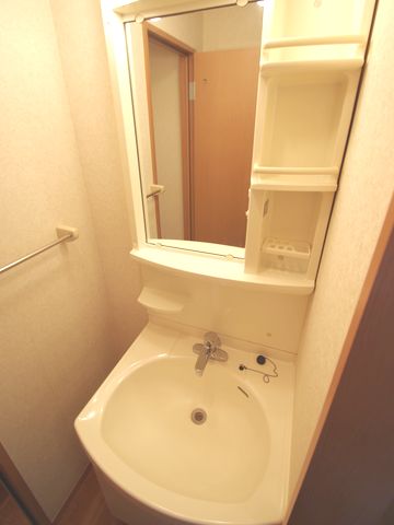 Washroom. Same building, It will be photos of the floor plan of the room. (image)