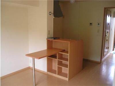 Living and room. Popular counter kitchen, Also with counter.