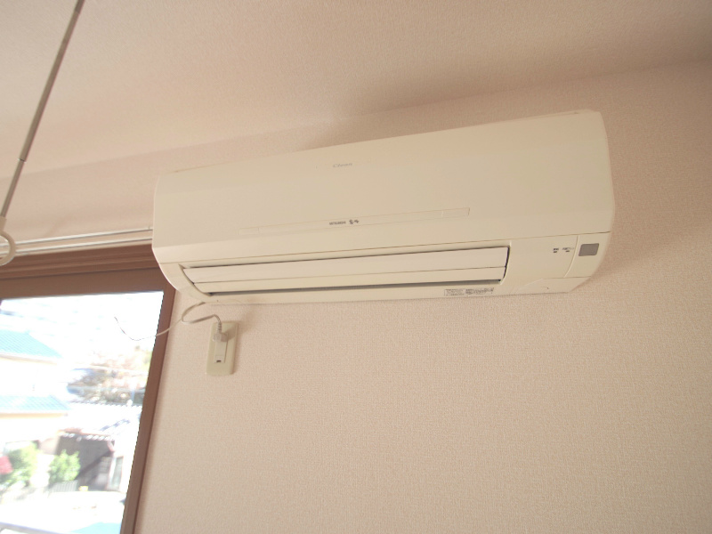 Other. Same building, It is a photograph of the same floor plan of the room.