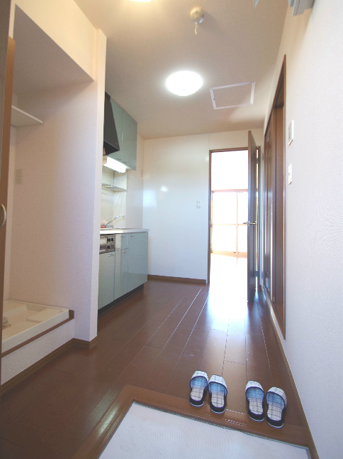 Entrance. Same building, It is a photograph of the same floor plan of the room.