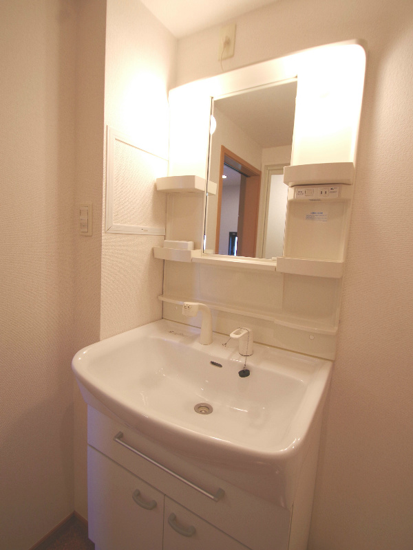 Washroom. It will be a reference photograph of the same building.