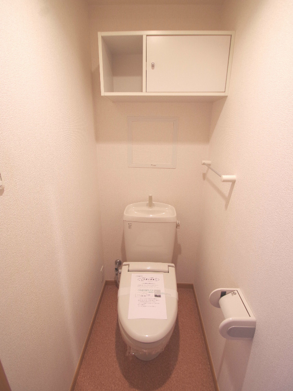 Toilet. It will be a reference photograph of the same building.