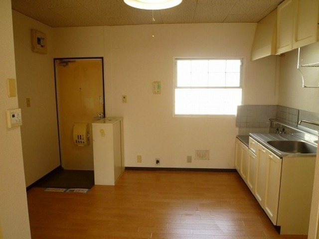 Living and room. Dining is also bright