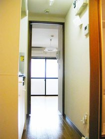 Entrance. The living room from the front door (the same property reference photograph)