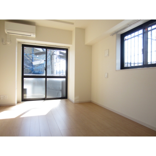 Living and room. Yes because it is a corner room bay window! A bright room!