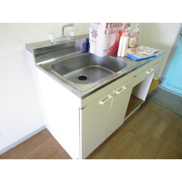 Kitchen. A refrigerator is put on the left side!