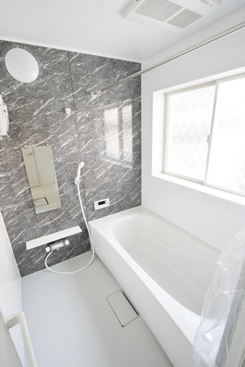 Bathroom. Panasonic bathroom with a window. Also it comes with heating drying function.