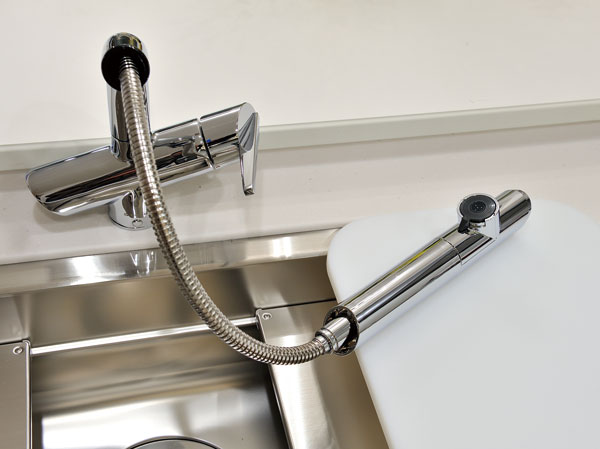 Kitchen.  [Water purifier integrated shower faucet] Hand shower faucet with a built-in water purifier. Water purification ・ Raw water of switching and Straight ・ It can be easily switched in the shower, Since the draw also hose, You can clean the sink until every corner.