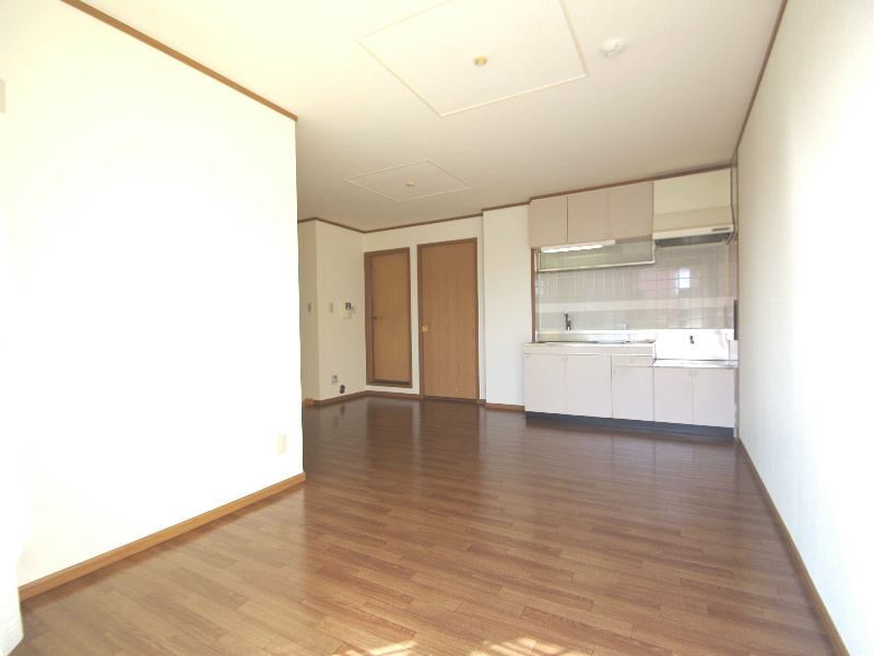 Living and room. Facing south in a bright living 11.5 Pledge!