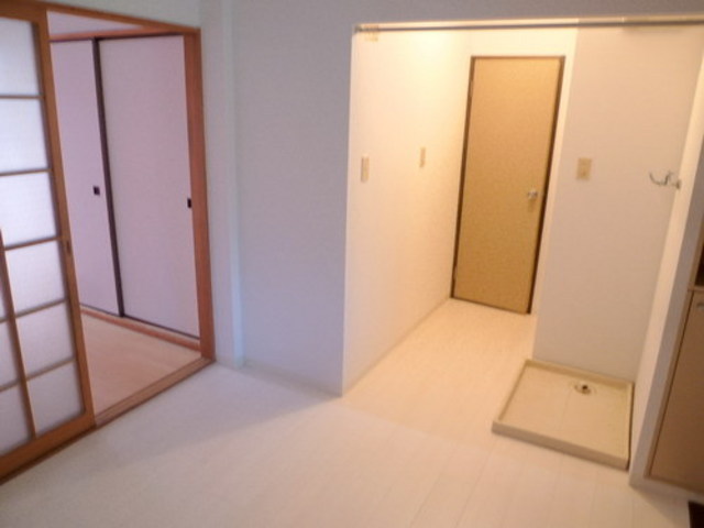 Living and room. It is a beautiful white interior