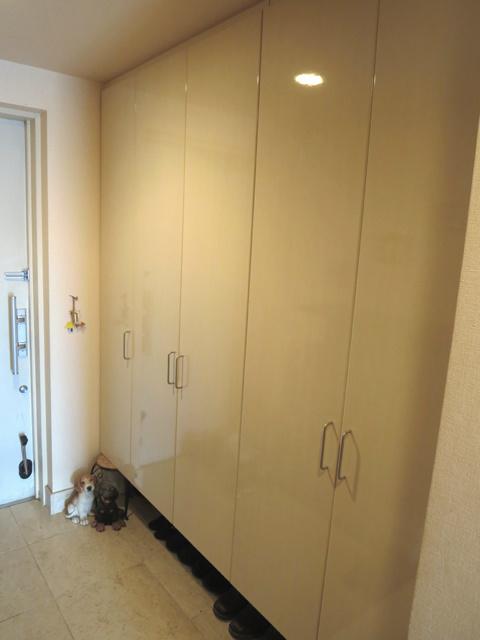 Entrance. Large shoes with cloak