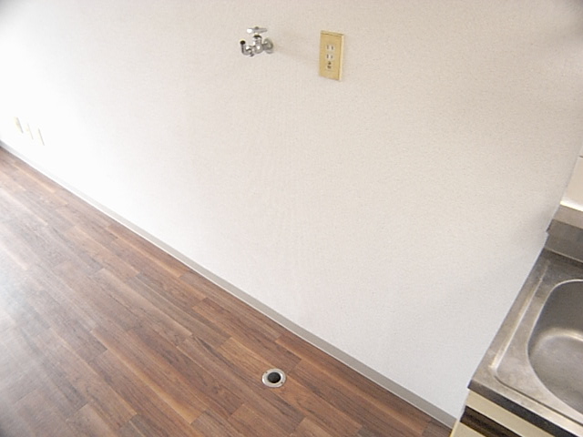 Other Equipment. Washing machine in the room