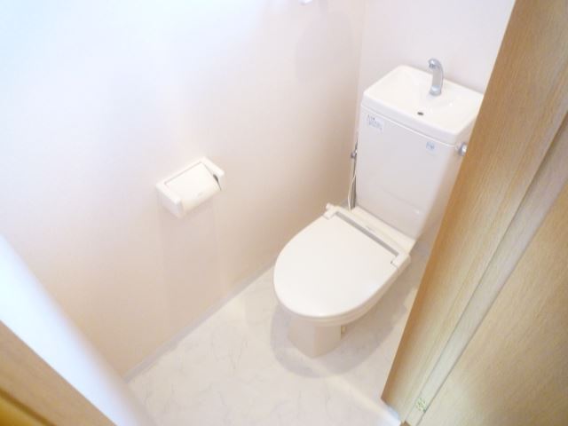 Toilet. There is also a window in the toilet