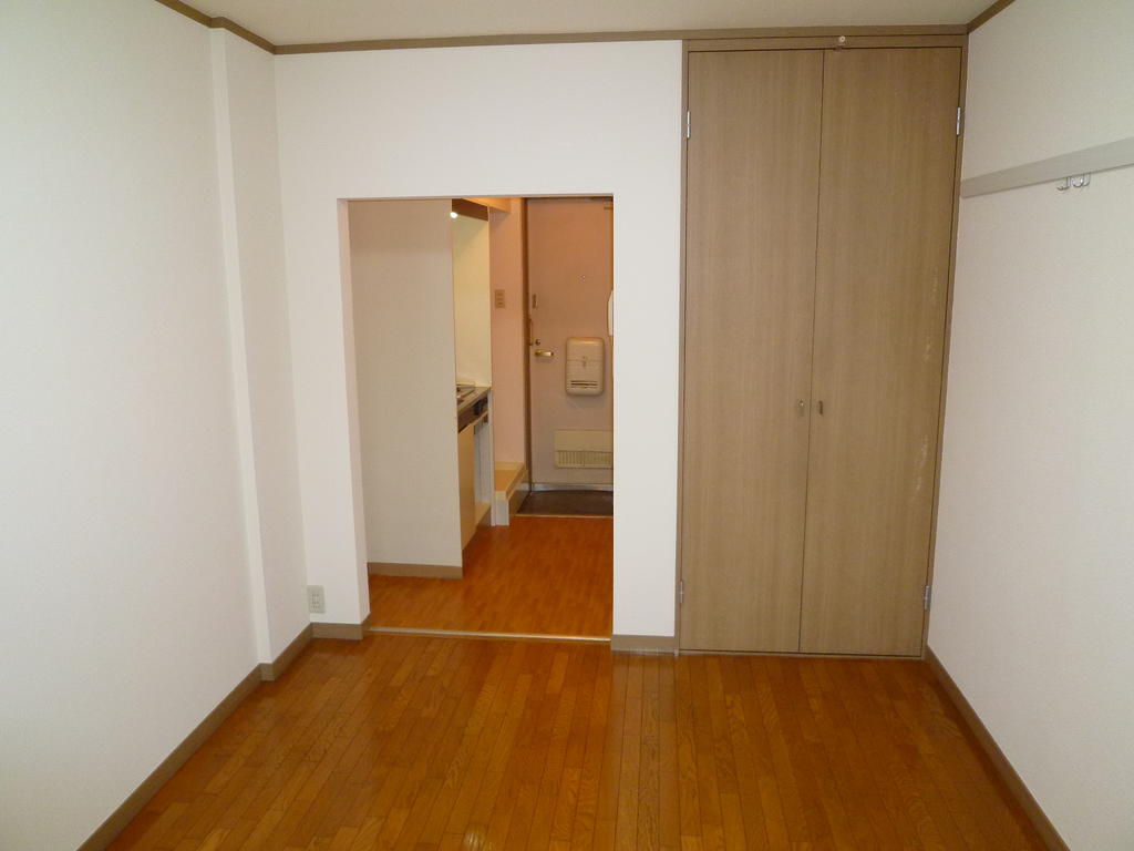 Living and room. There is a large storage facility.