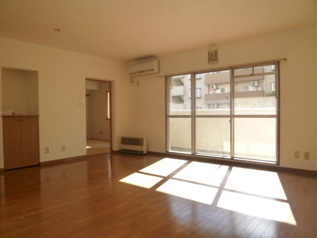 Living. Living is the breadth of a room.