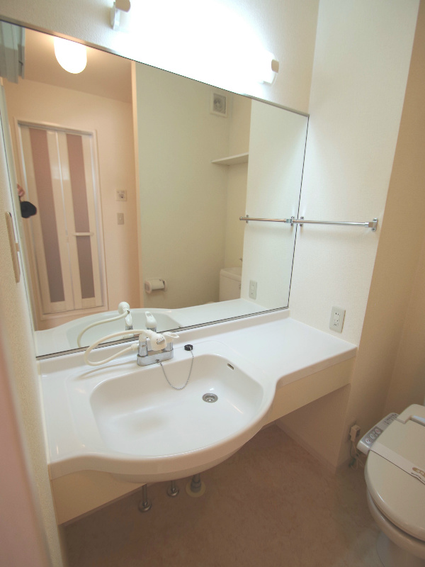 Washroom. It will be in a different building of photo. (image)