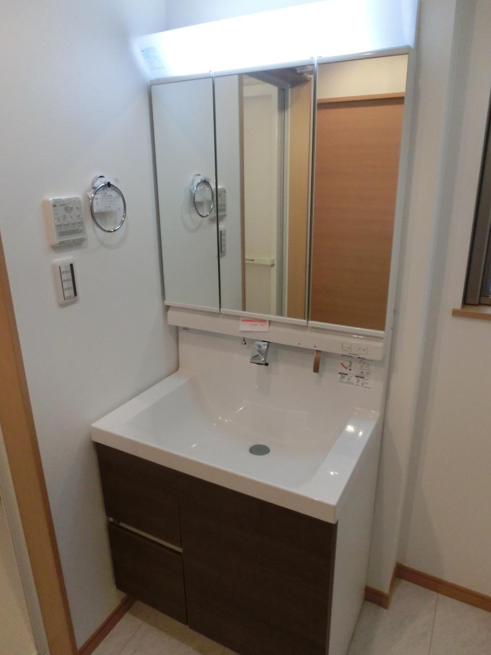 Wash basin, toilet. Wash basin with a three-sided mirror back storage, Shower Faucets