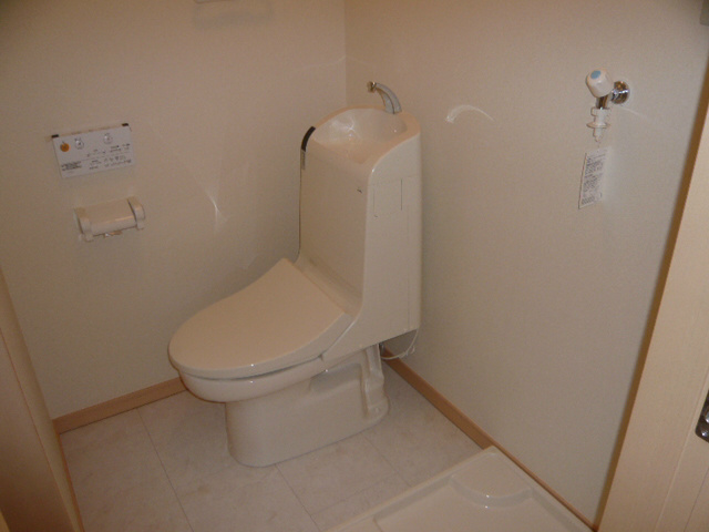 Toilet. Warm water washing toilet seat