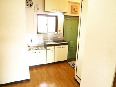 Other room space. There is a window in the kitchen