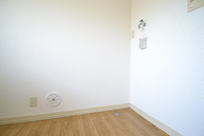 Other room space. Washing machine in the room