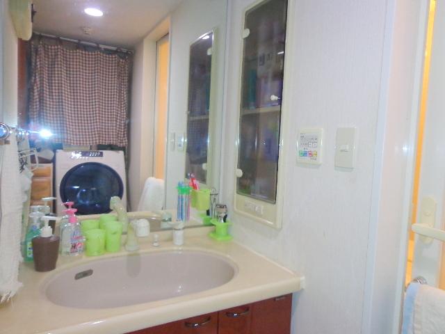 Wash basin, toilet. It is also beautiful vanity.