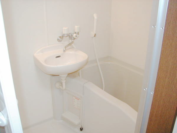 Bath. With bathroom basin