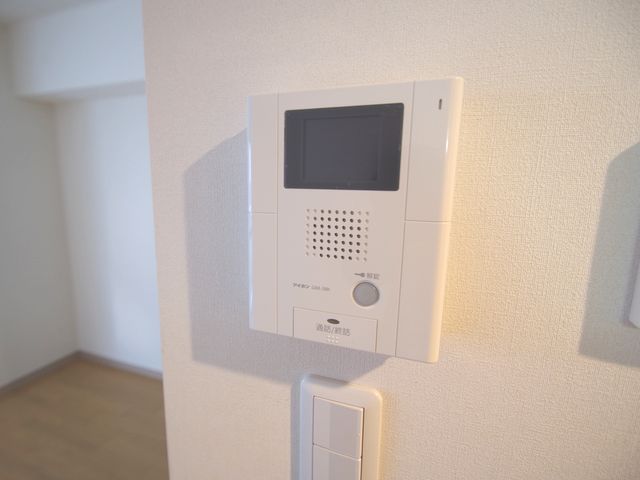 Security. Same building, It will be photos of the floor plan of the room. (image)