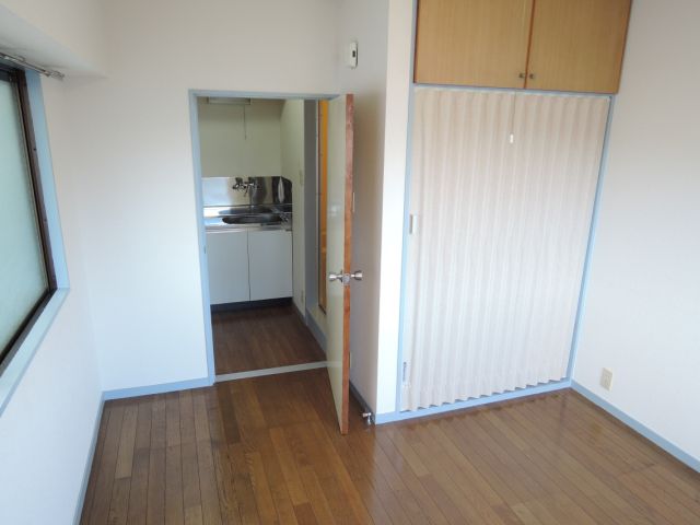 Living and room. Separated by a kitchen and living room