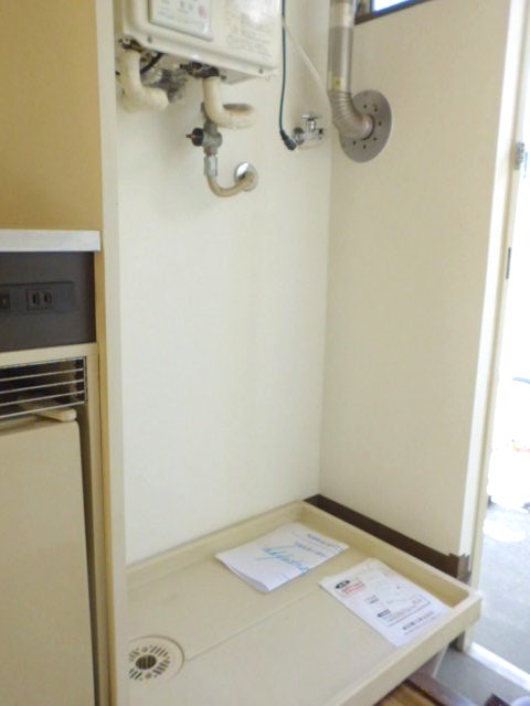 Other Equipment. Washing machine in the room