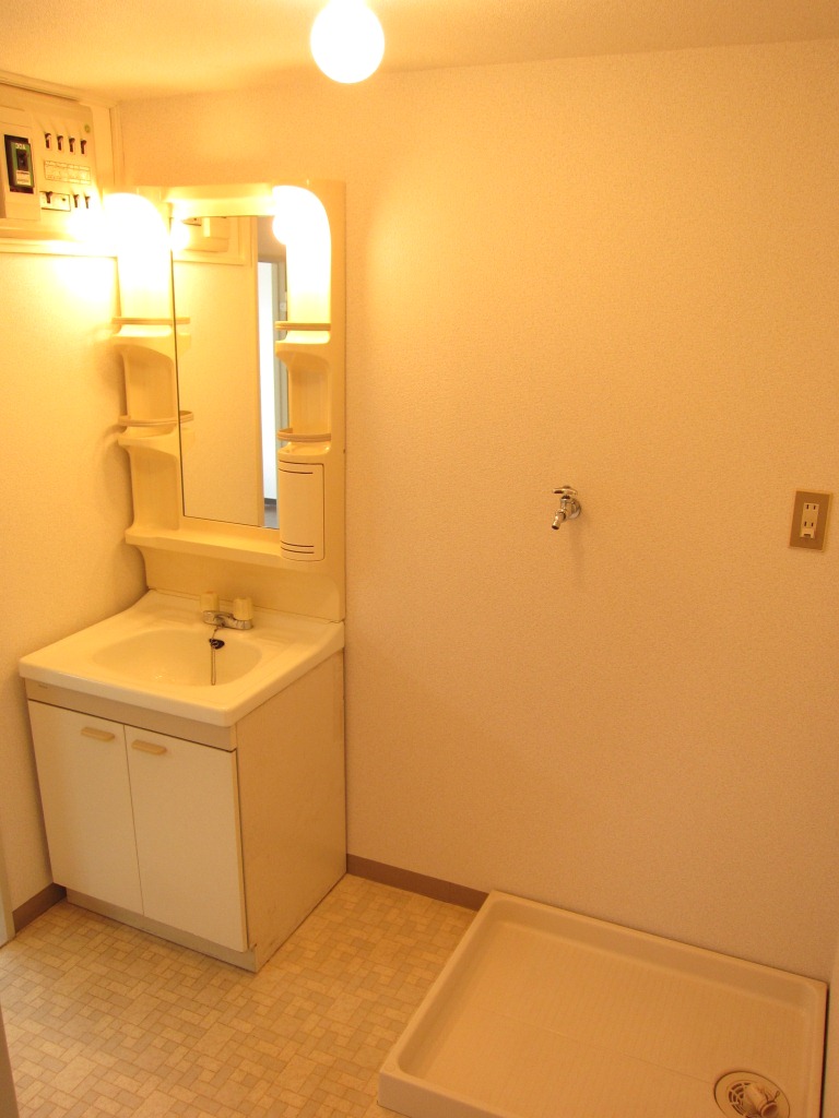 Washroom. Washing machine is put in a room