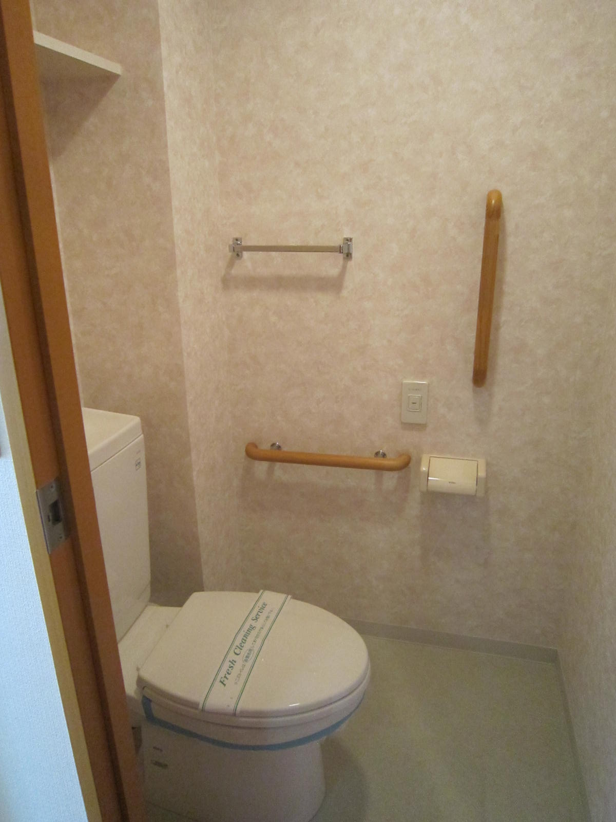 Toilet. With toilet in the handrail